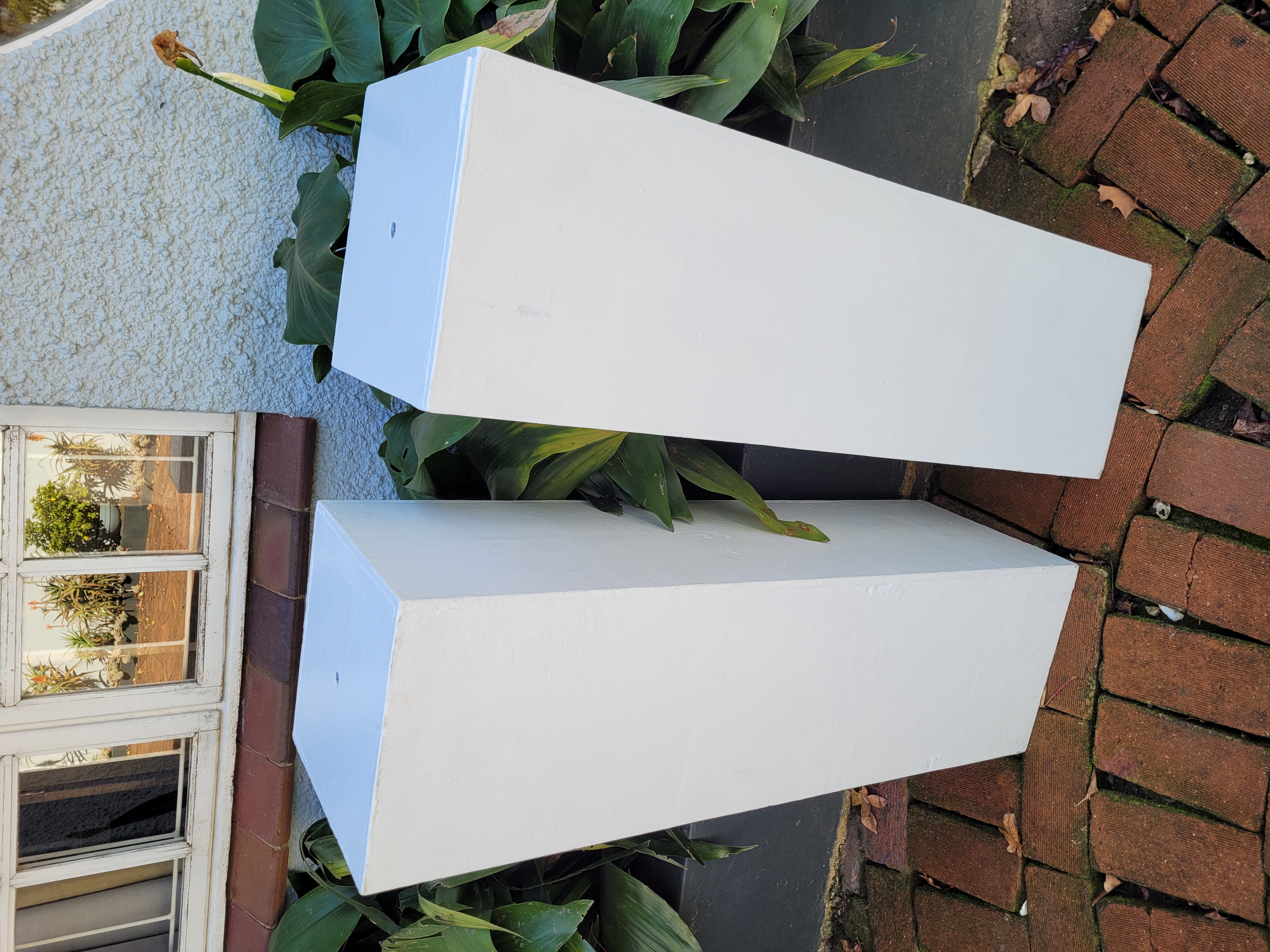 Tall White Plinths